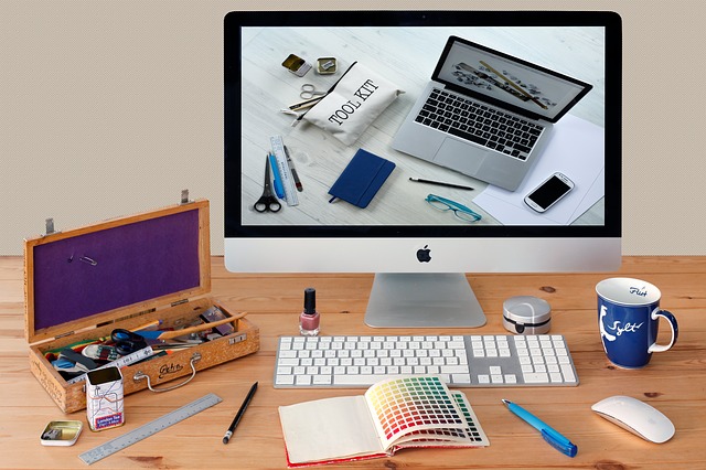 Desktop with iMac and toolkit